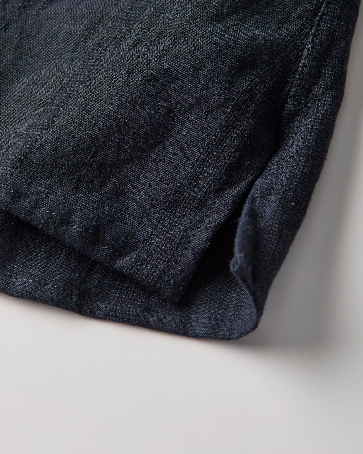 the side hem of a cotton shirt