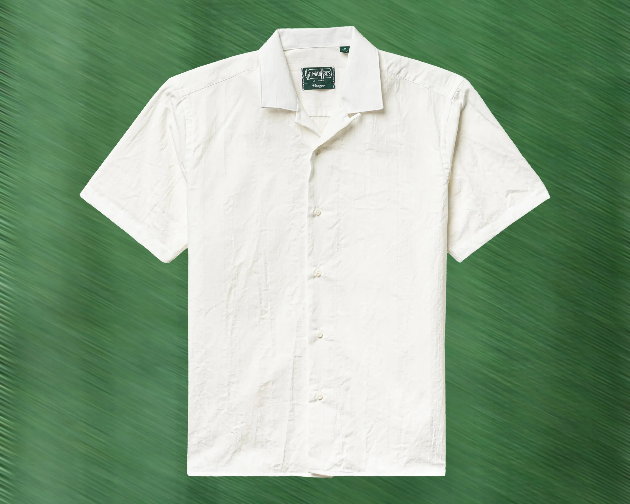 a white short sleeve camp collar shirt