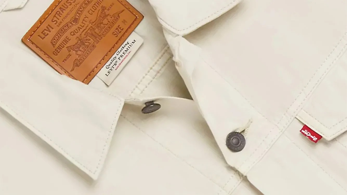 close up of a white Levi's trucker jacket