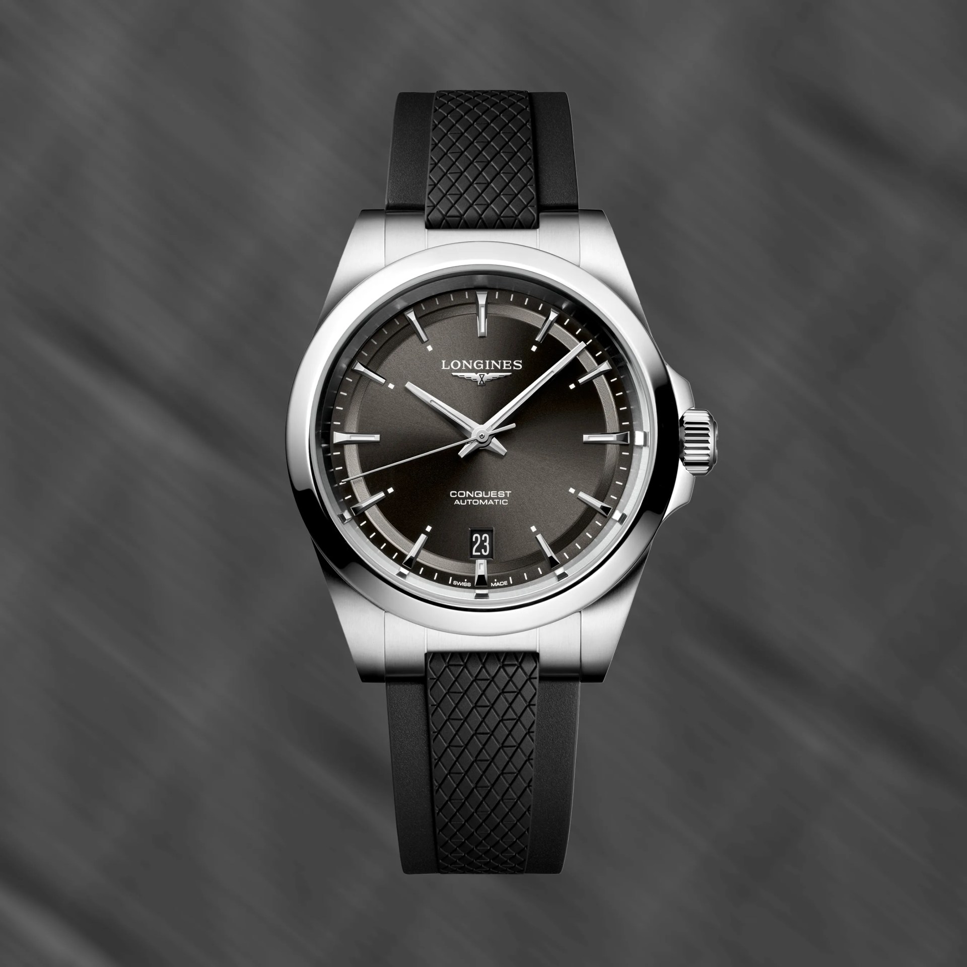 a steel watch with a black dial