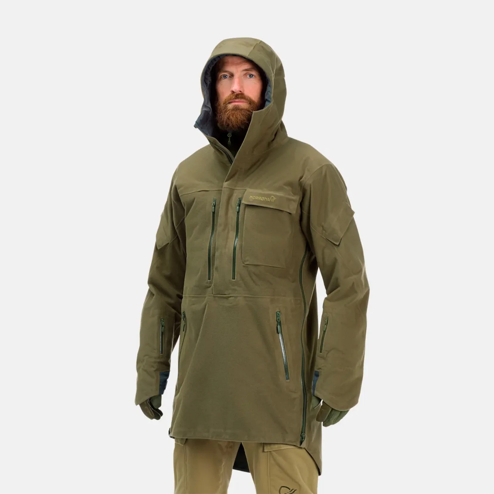 a man wearing a green parka