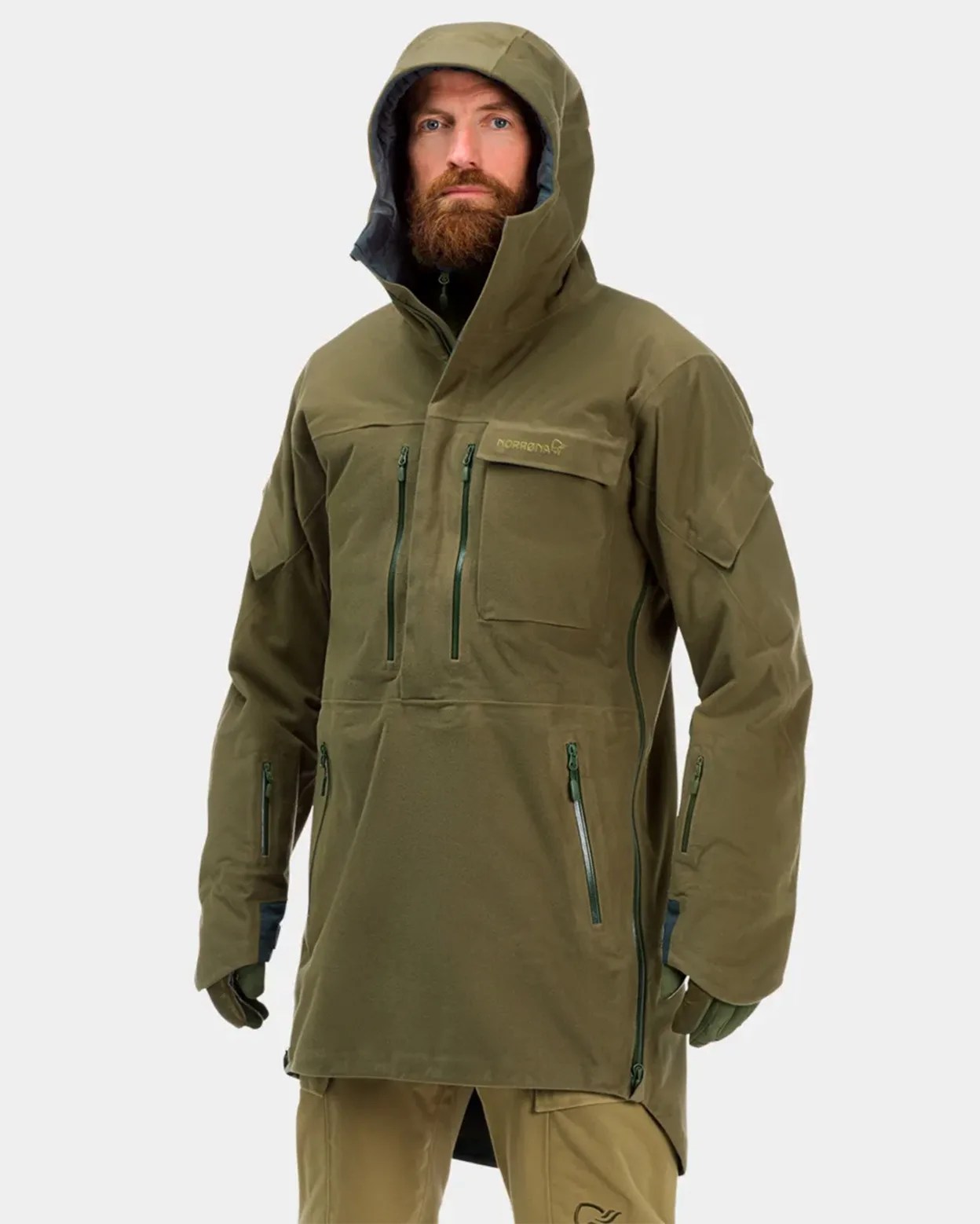 a man wearing a green parka