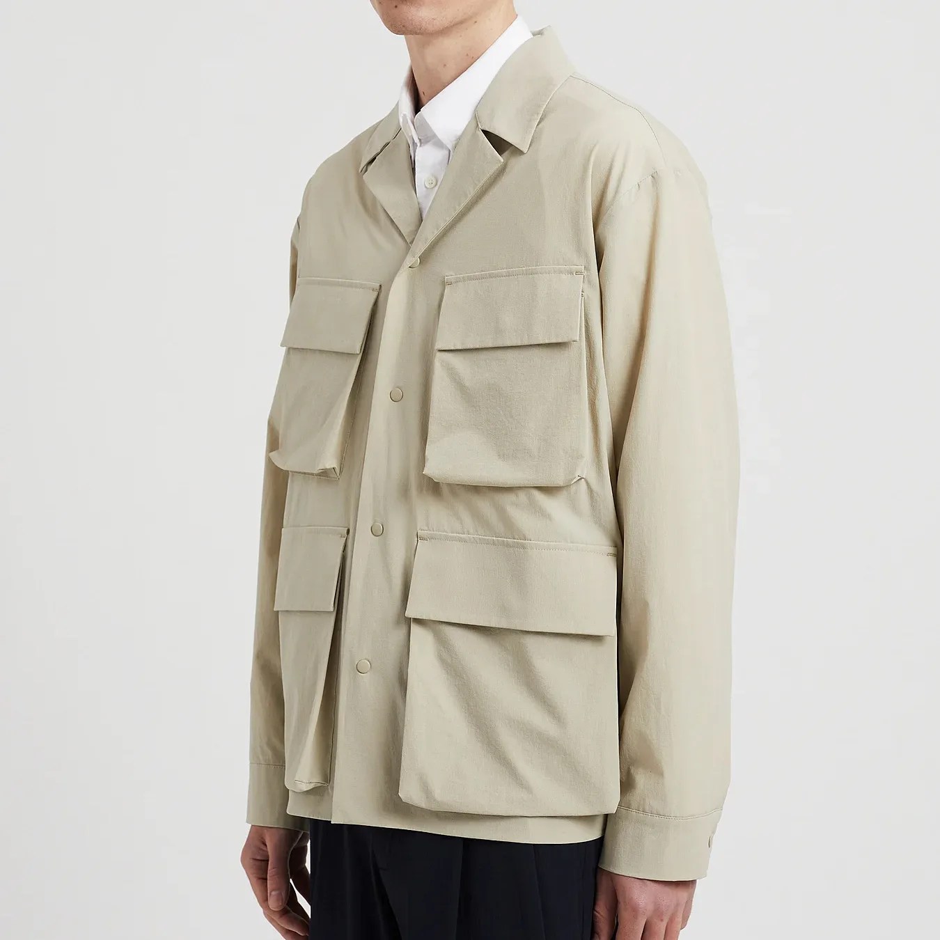 a man in a white safari jacket