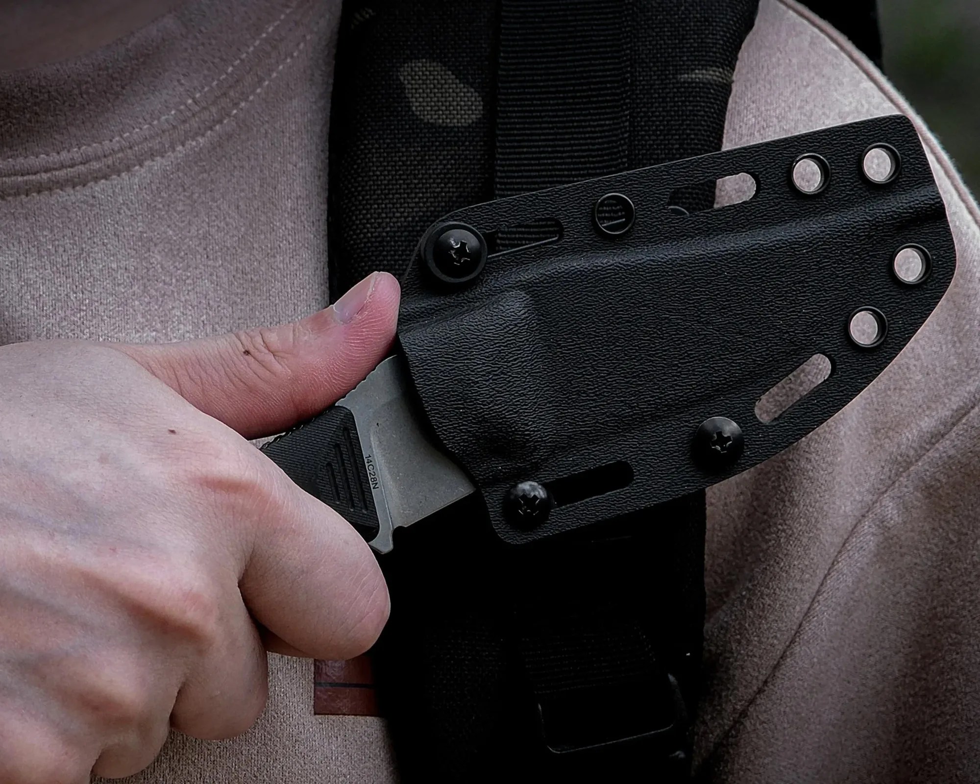 Vosteed H Back knife being pulled from sheath