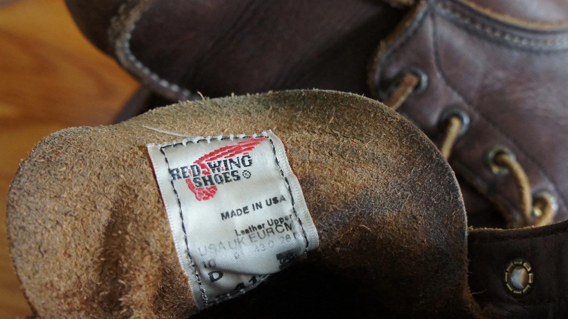 a tag on a pair of boots that reads made in the usa
