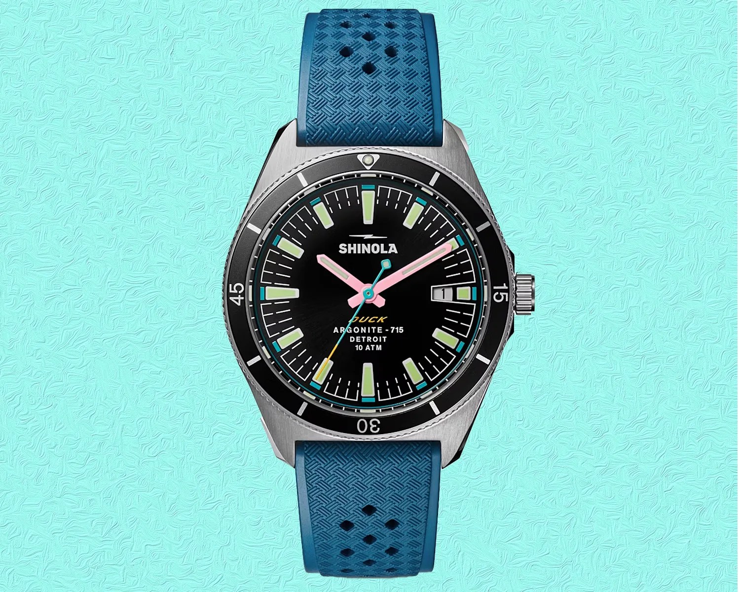 a dive watch with a black dial and blue band