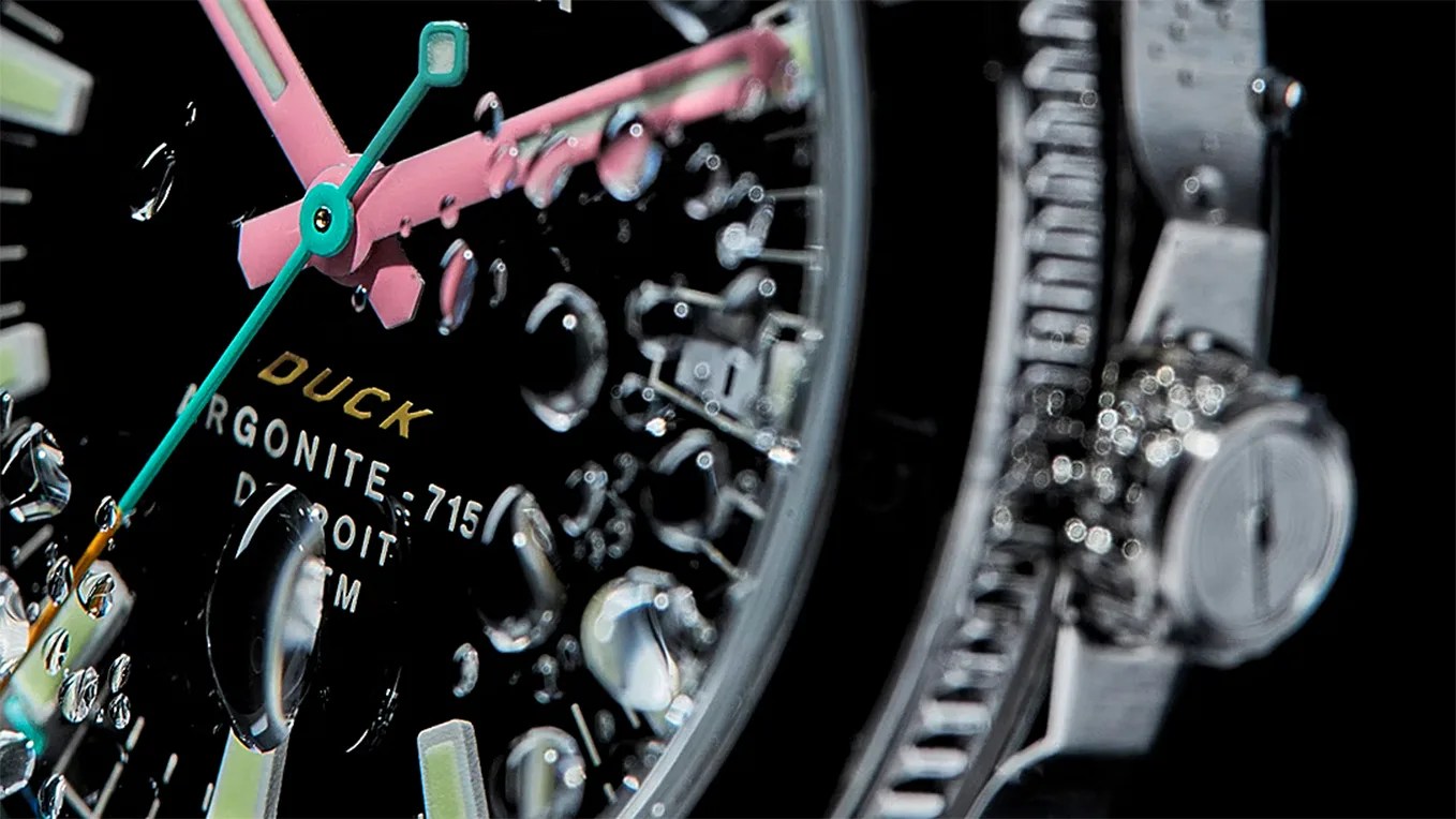 a black watch dial under water