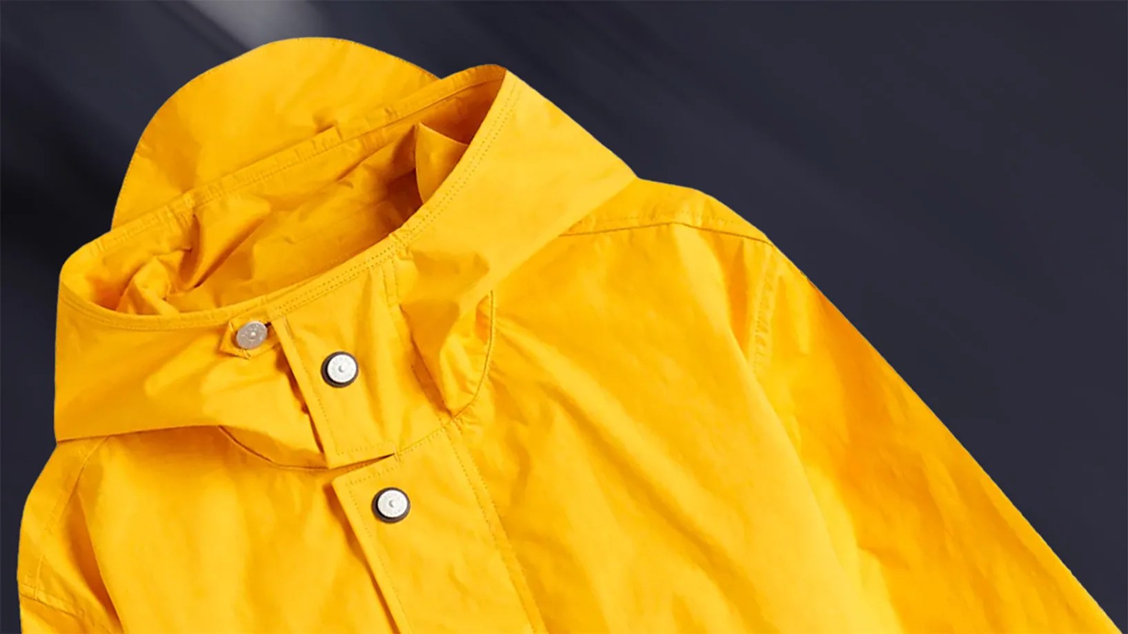 a yellow Stone Island raincoat