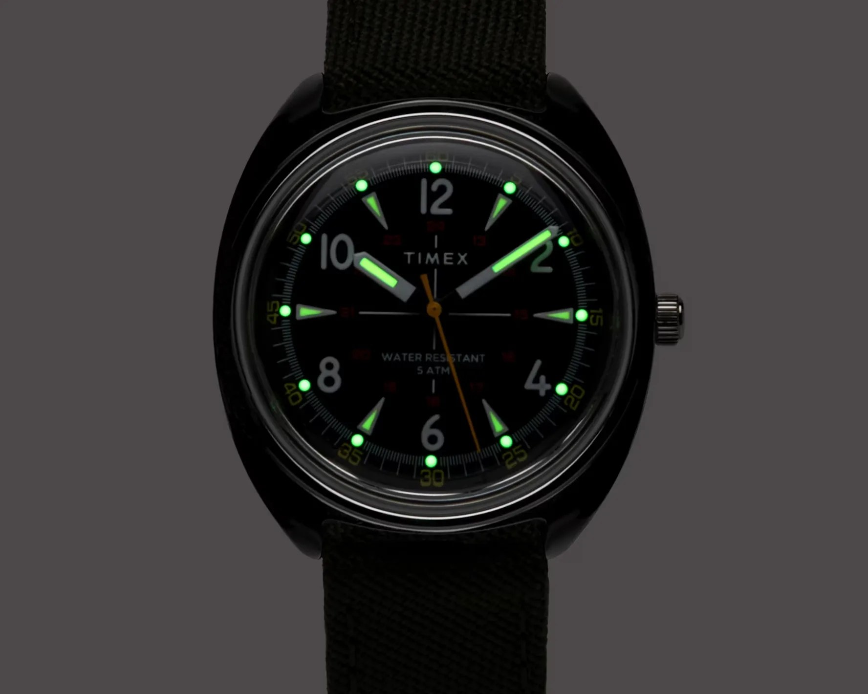 a watch in the dark with lume hands