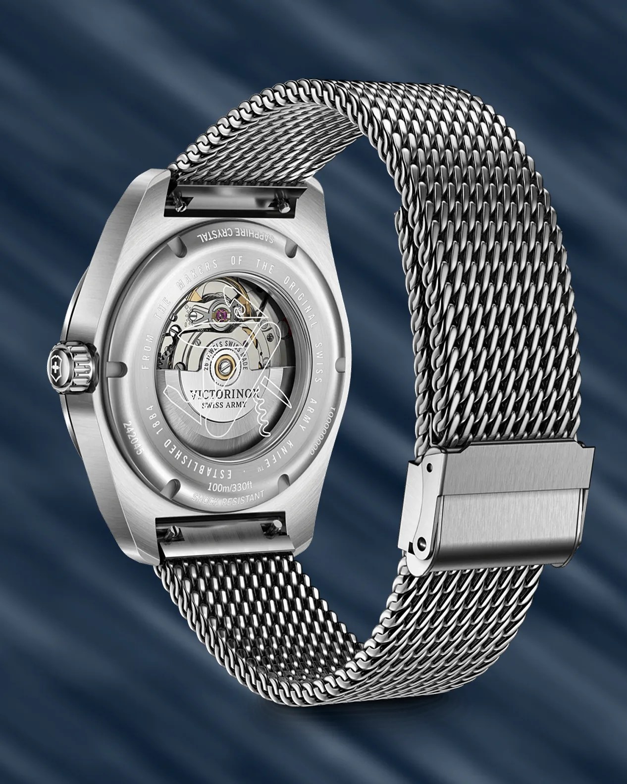 the steel mesh bracelet and exhibition case back of a Victorinox watch