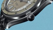the crown, bezel and case of a Yema dive watch