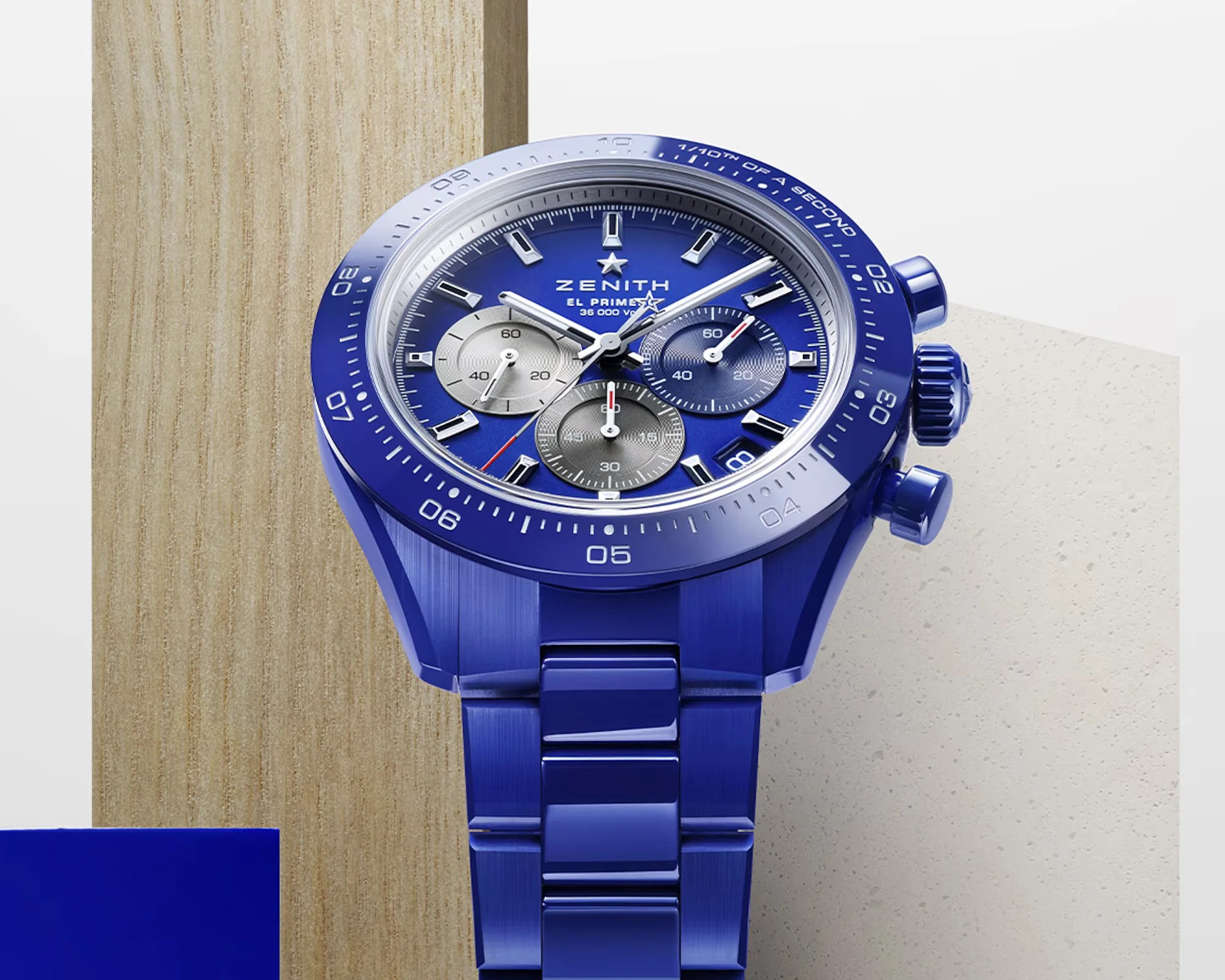 a blue Zenith chronograph watch