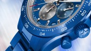 the dial, bezel and crown of a blue Zenith chronograph watch