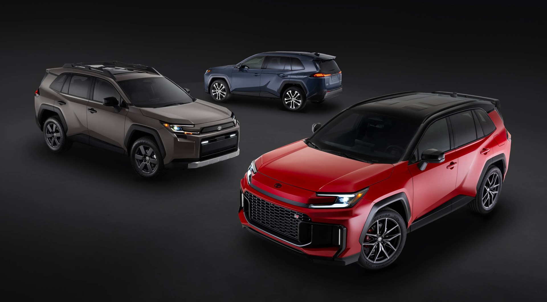 All three design versions of the 2026 Toyota RAV4 are shown against a black background.