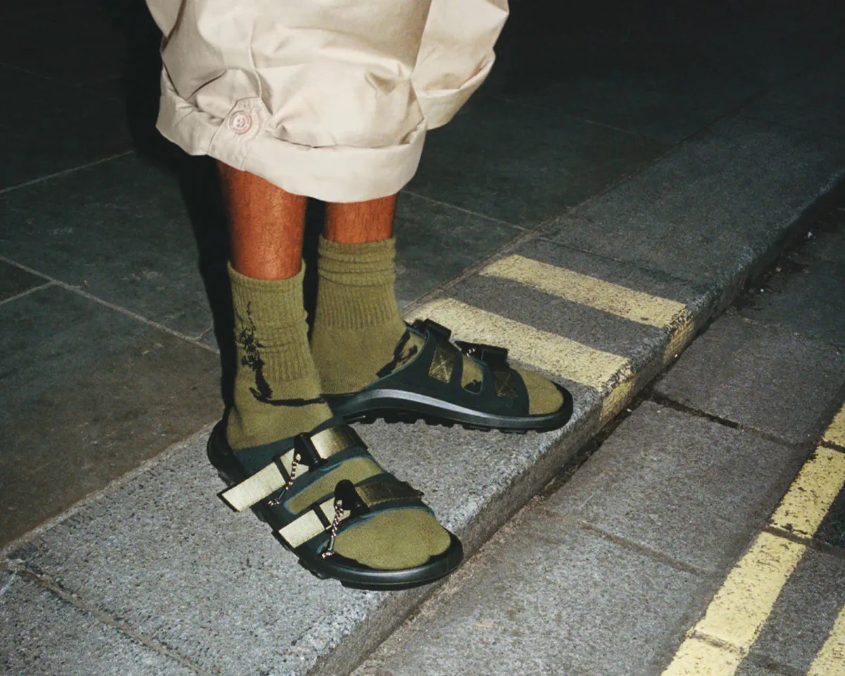 Person wearing Birkenstock Maharishi Mogami Terra Tech sandals