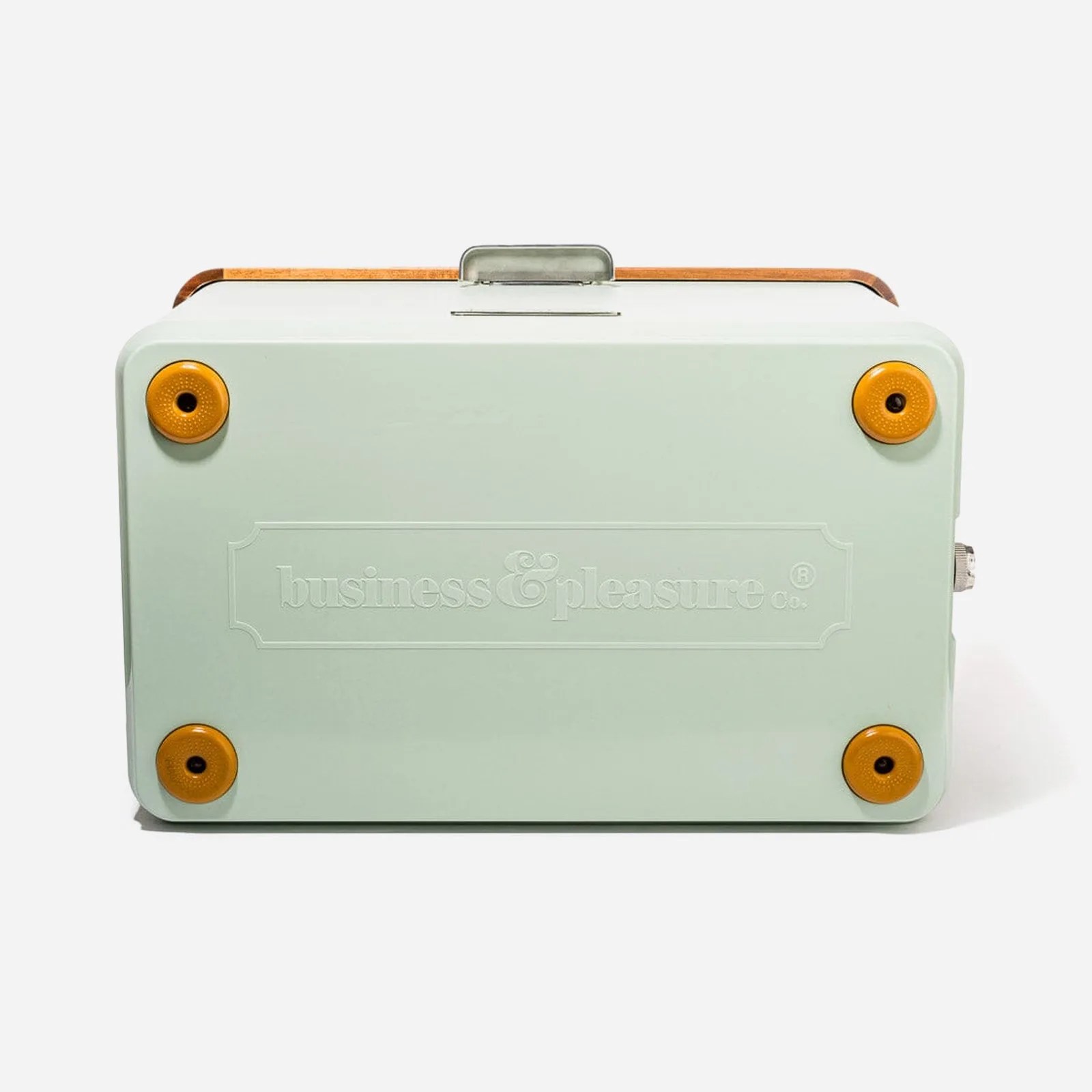 The bottom of a Business & Pleasure Co. The Hemingway Cooler showing the coolers four integrated feet. 