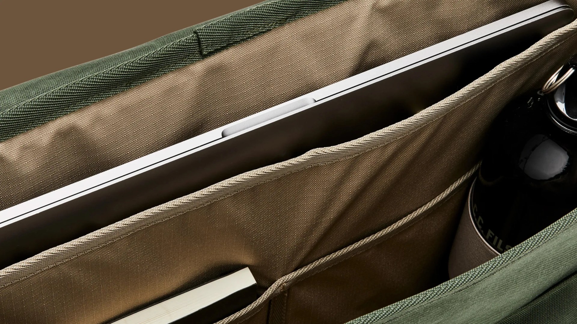 An interior shot of the organization pockets of FIlson's Surveyor Messenger Bag