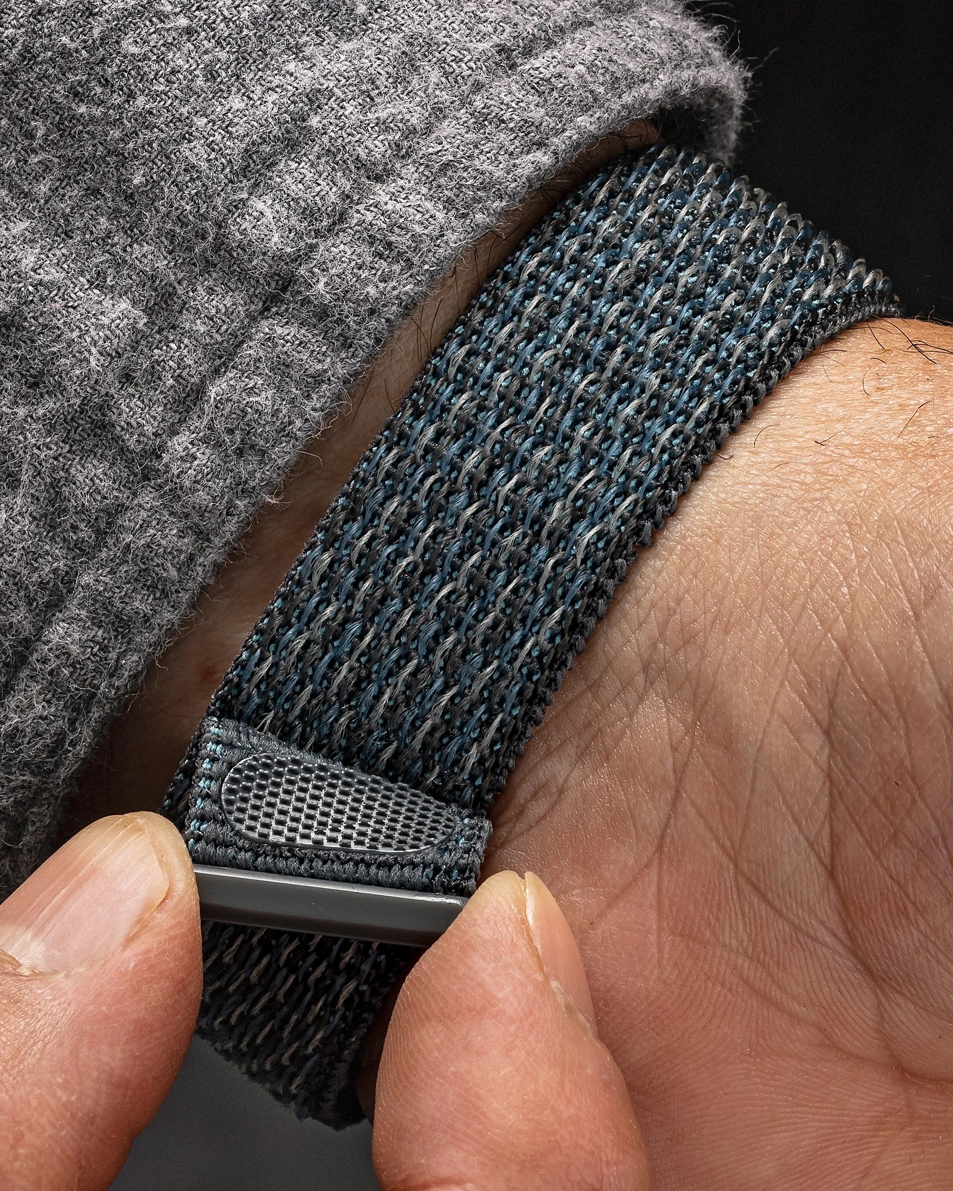 a watch strap on a man's wrist