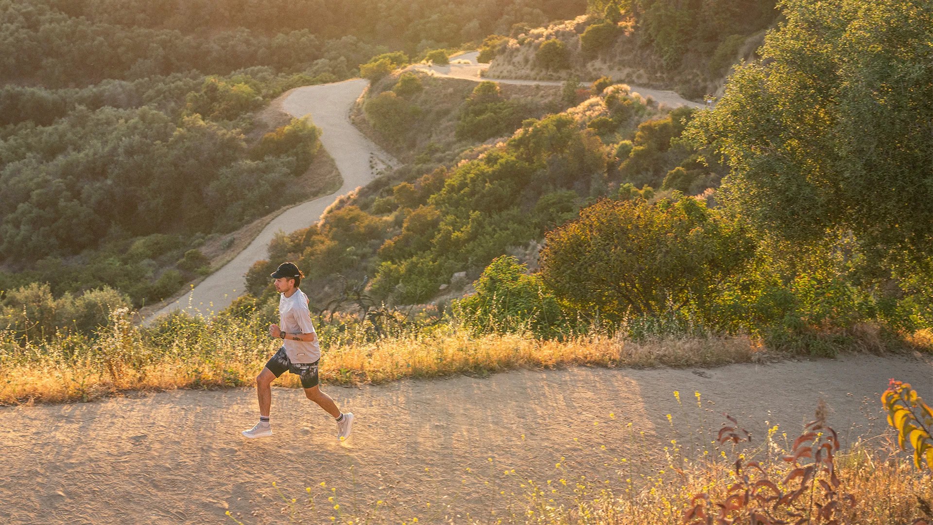 man running on dirt path