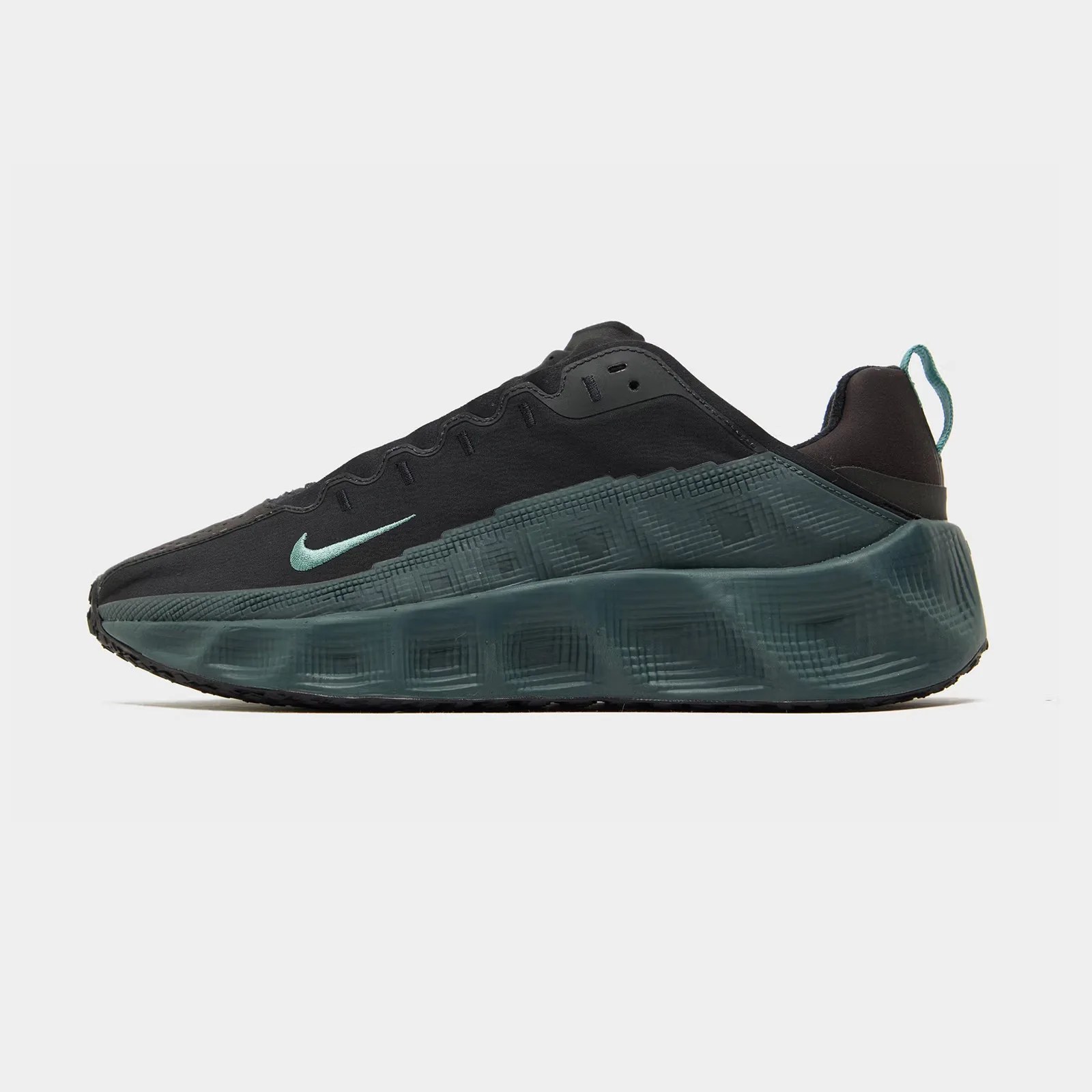 A Nike AVA Rover sneaker shown in profile in black and forest green