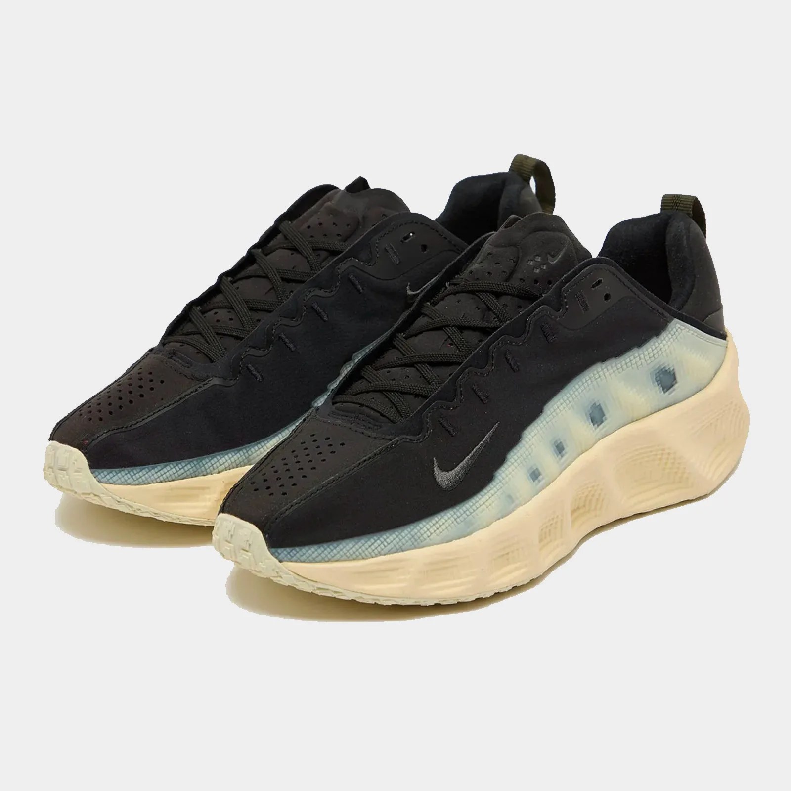 A pair of black Nike AVA Rover sneakers in black and light white cream