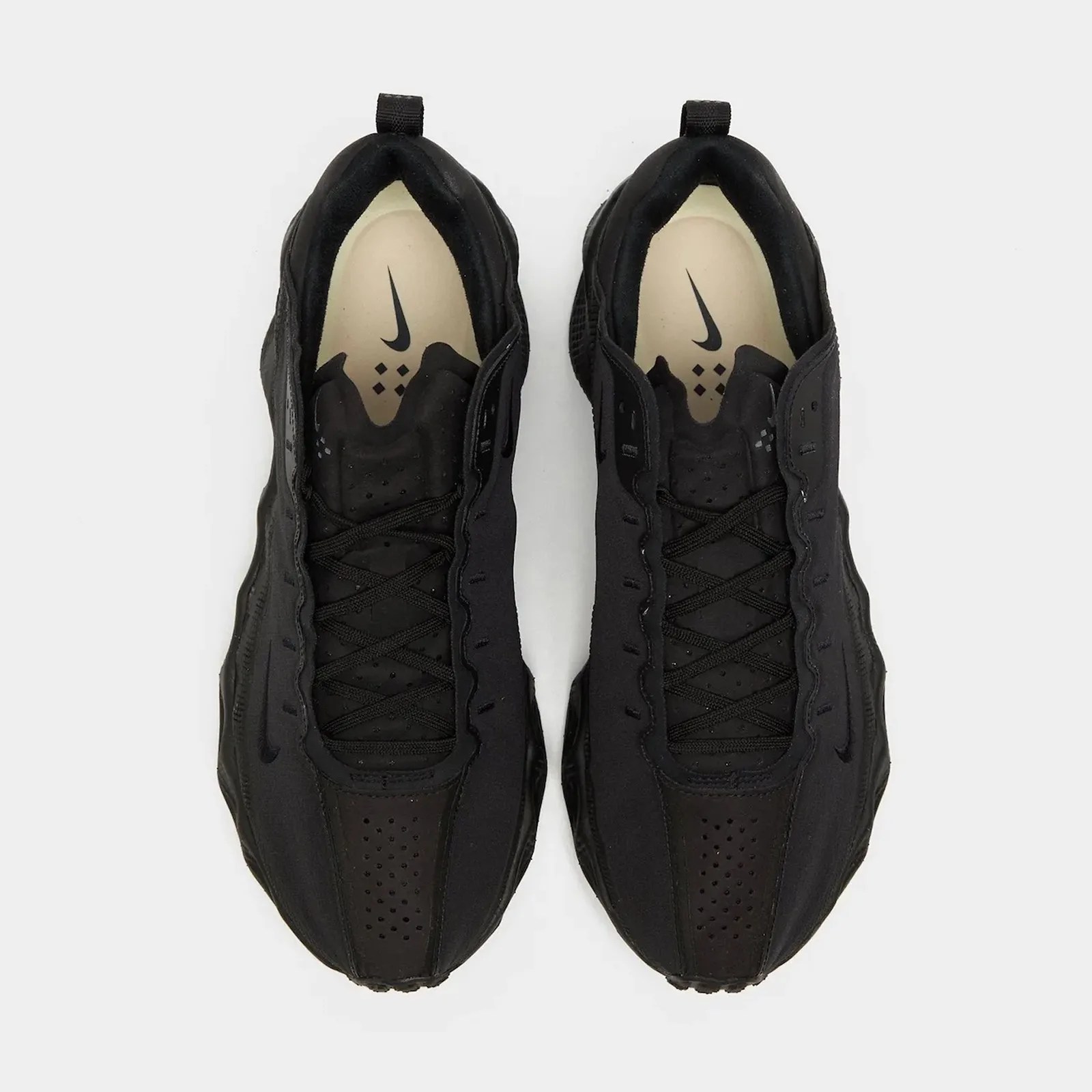 A Nike AVA Rover sneaker shown from above in all black. 