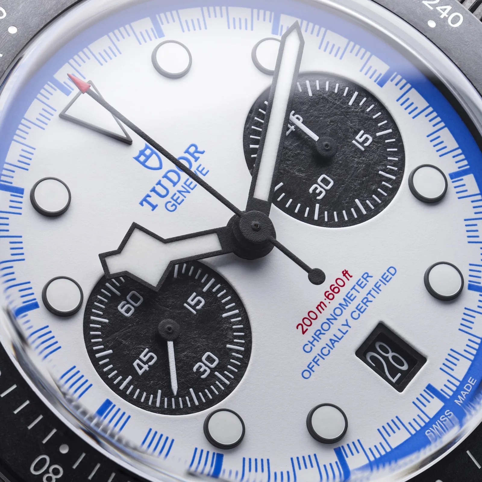 A close up of the carbon fiber subdiles on the Tudor Black Bay Chrono "Carbon 25" watch 