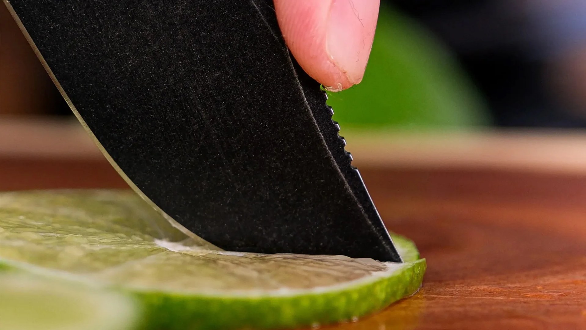 Vosteed Quokka Bowie Knife closeup cutting a lime