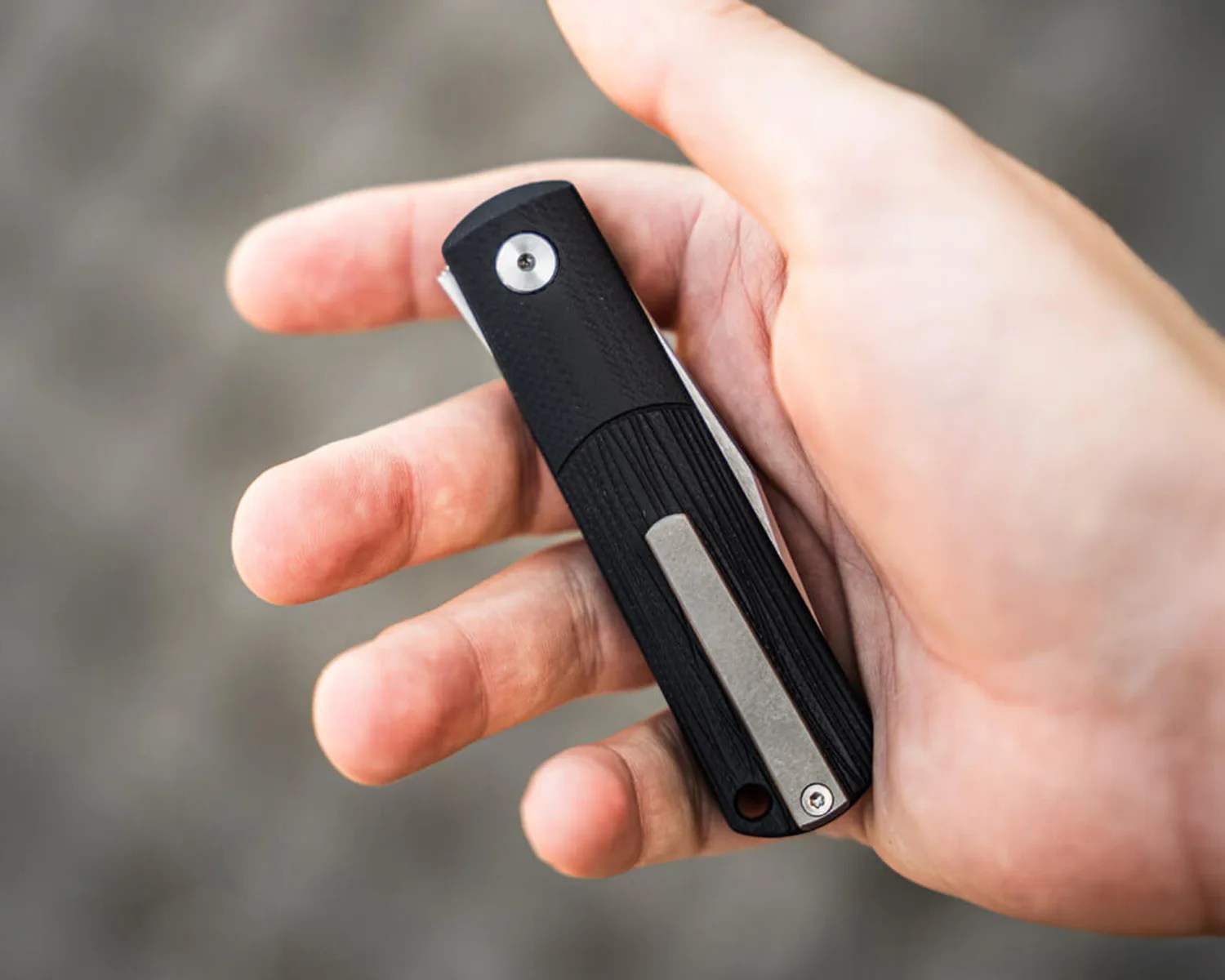 böker brlw g10 offside folded in hand