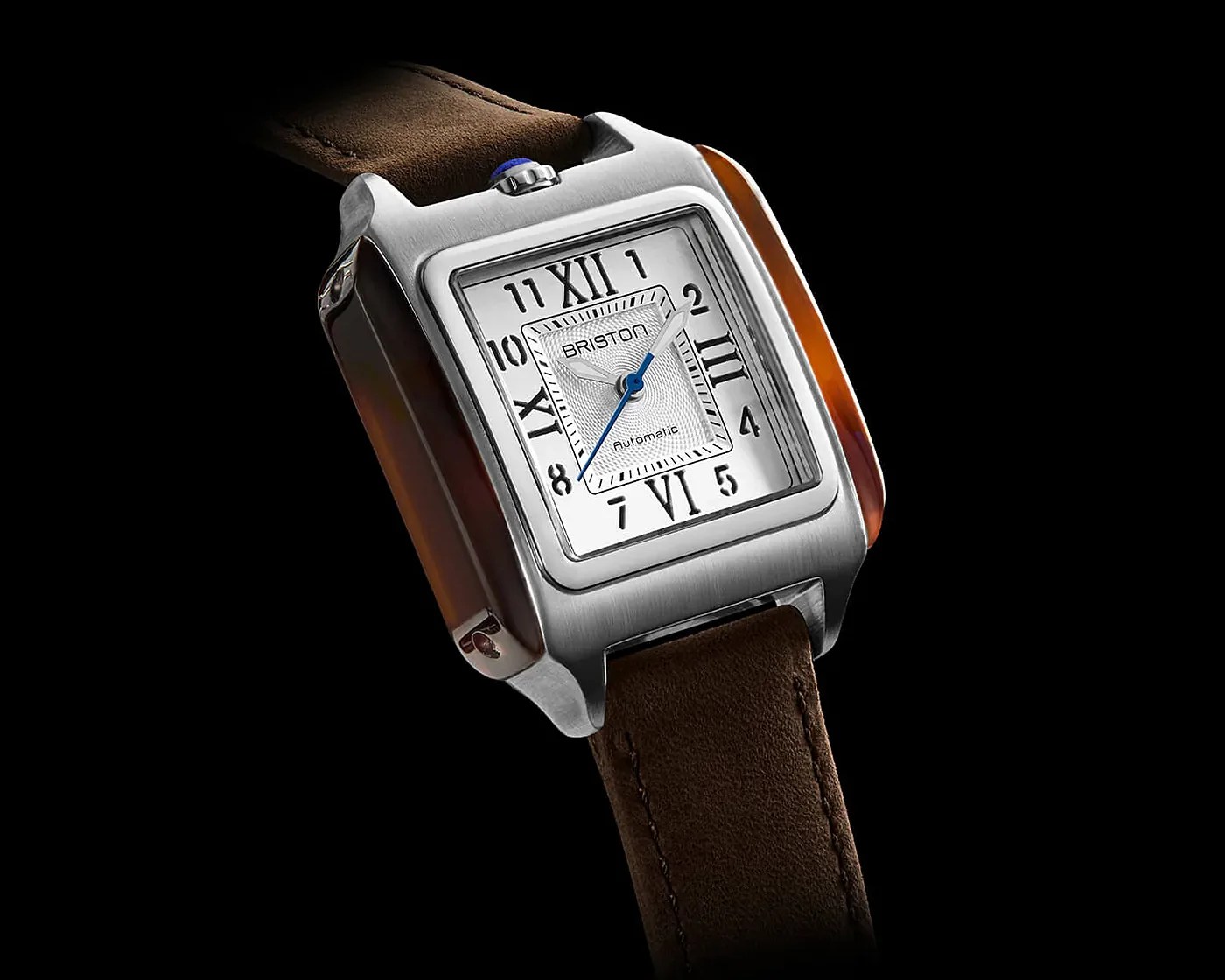 a square Briston dress watch with a brown leather strap