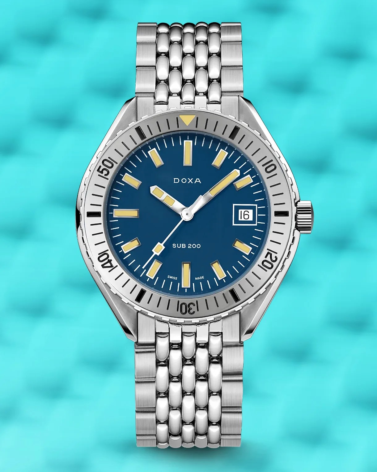 a blue dial Doxa dive watch with a steel bracelet