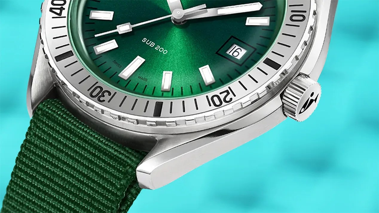 a green Doxa dive watch with a steel bezel