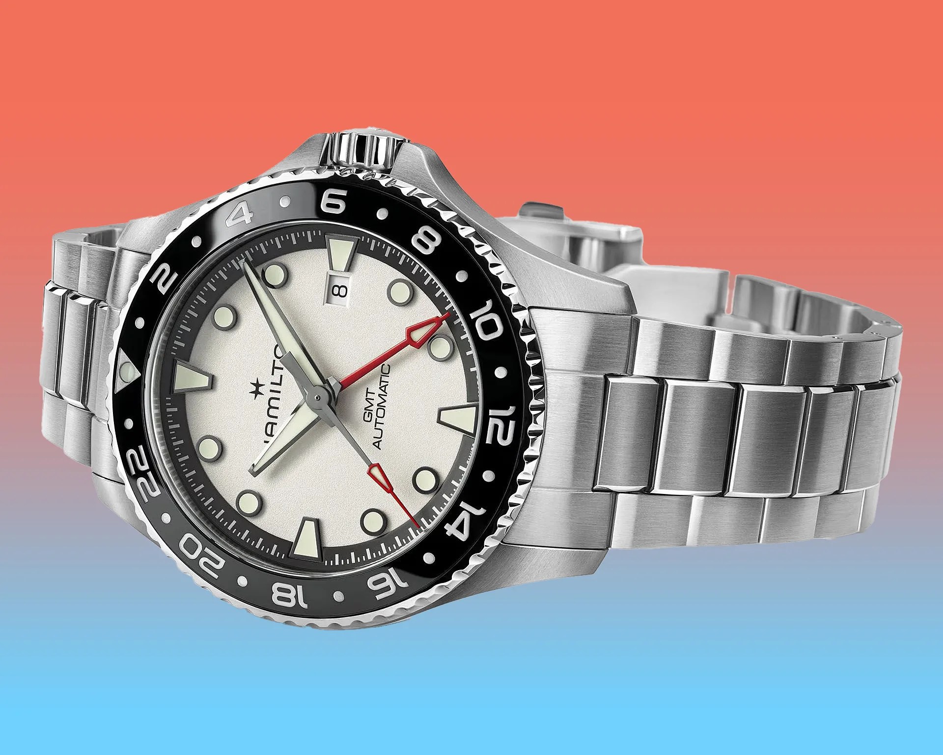 a steel Hamilton dive watch with a GMT dial