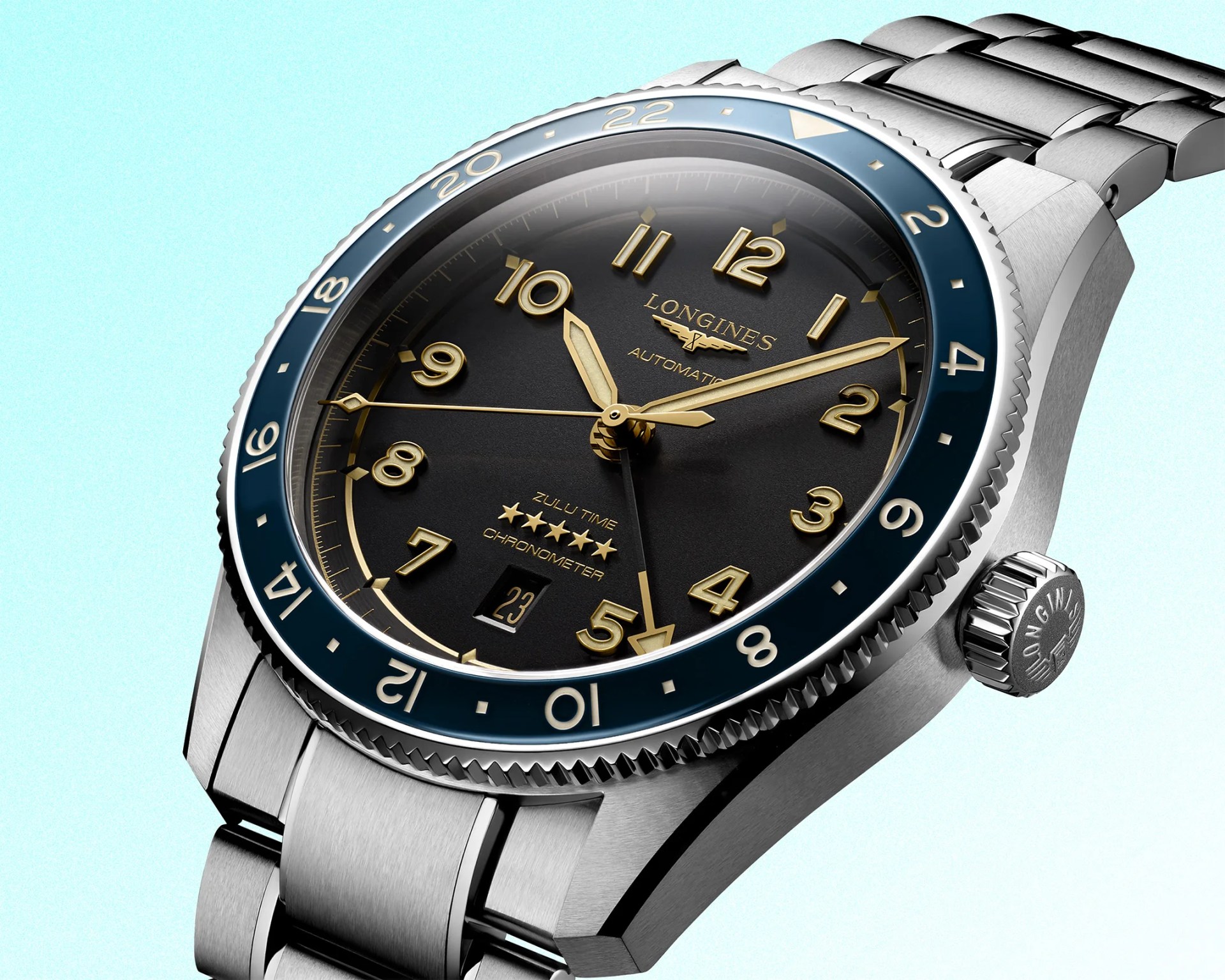a Longines watch with a black dial and blue bezel
