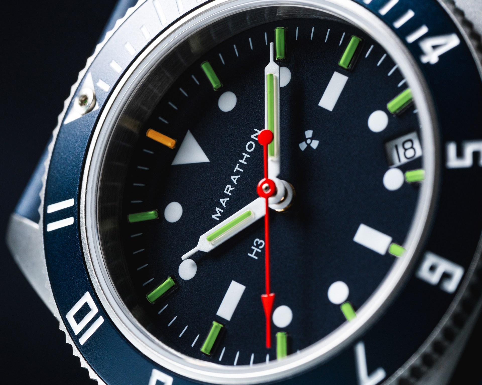 the blue dial of a Marathon watch