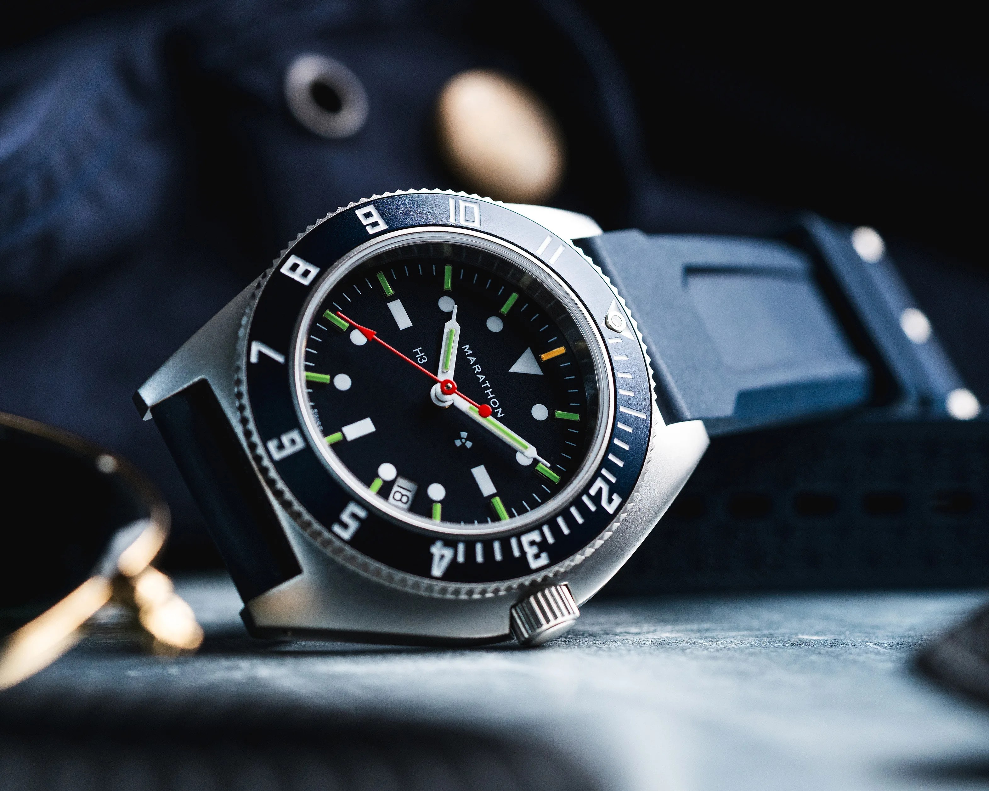 a blue Marathon dive watch