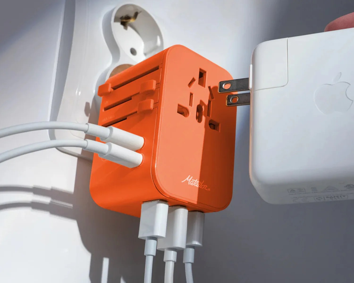 matador global travel adapter plugged