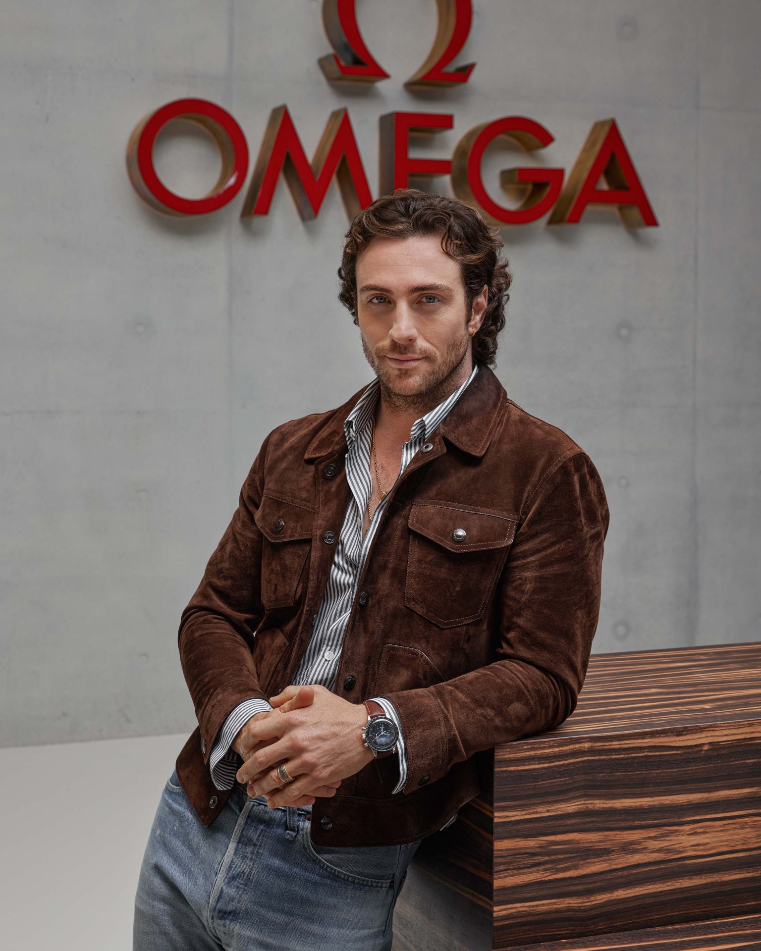 aaron taylor-johnson at omega headquarters