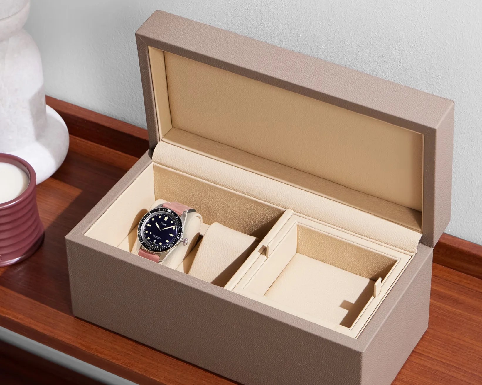 a taupe watch and jewelry case
