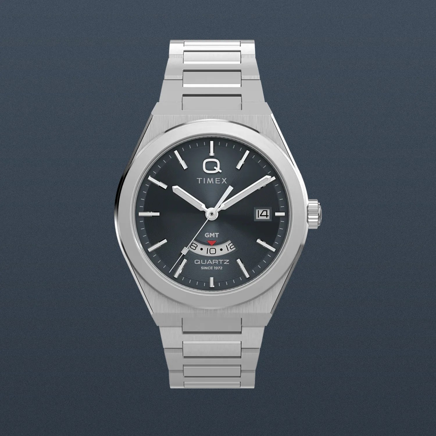 a steel Q Timex GMT watch with a blue dial