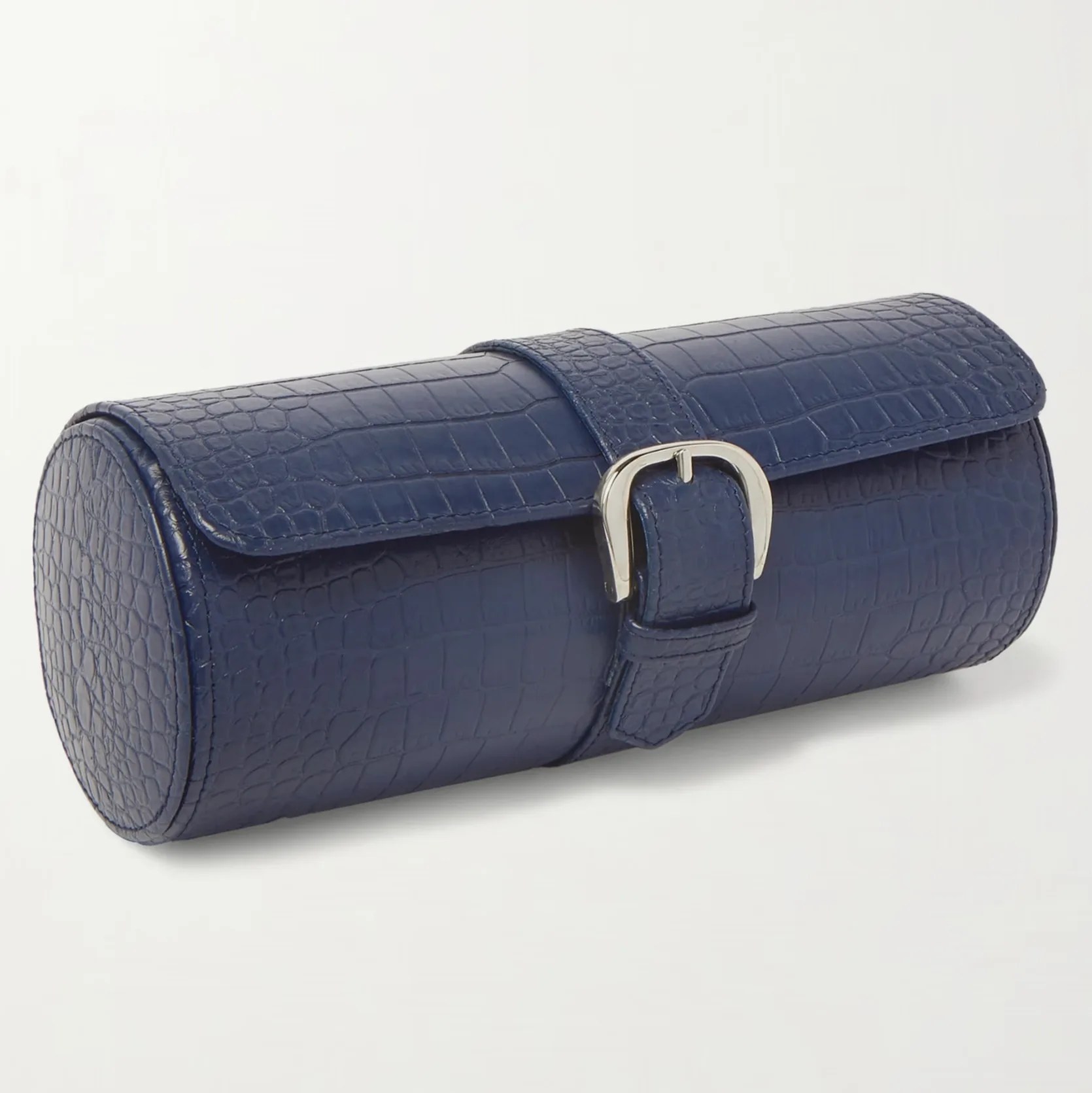 a blue leather watch roll