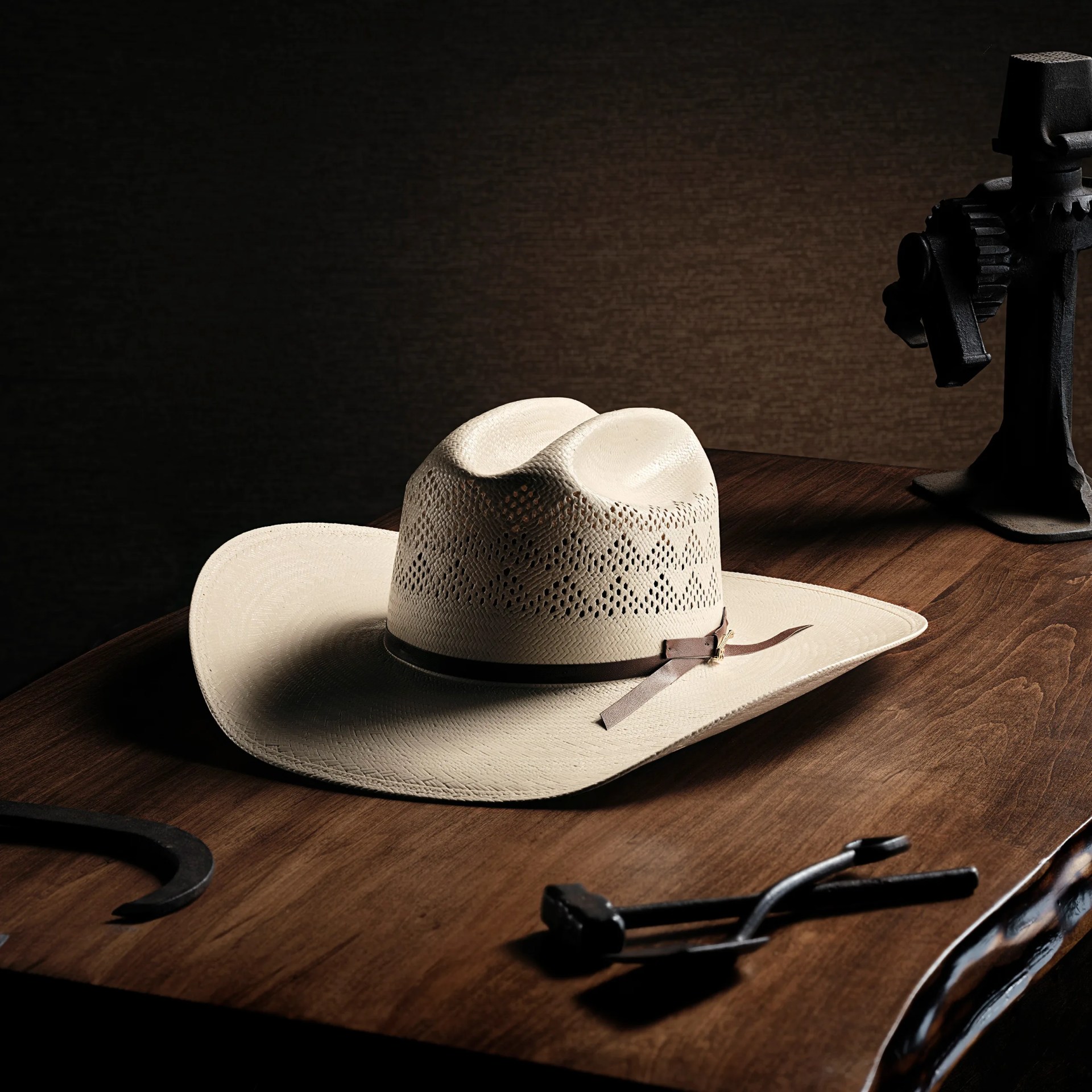 a straw cowboy hat on a table