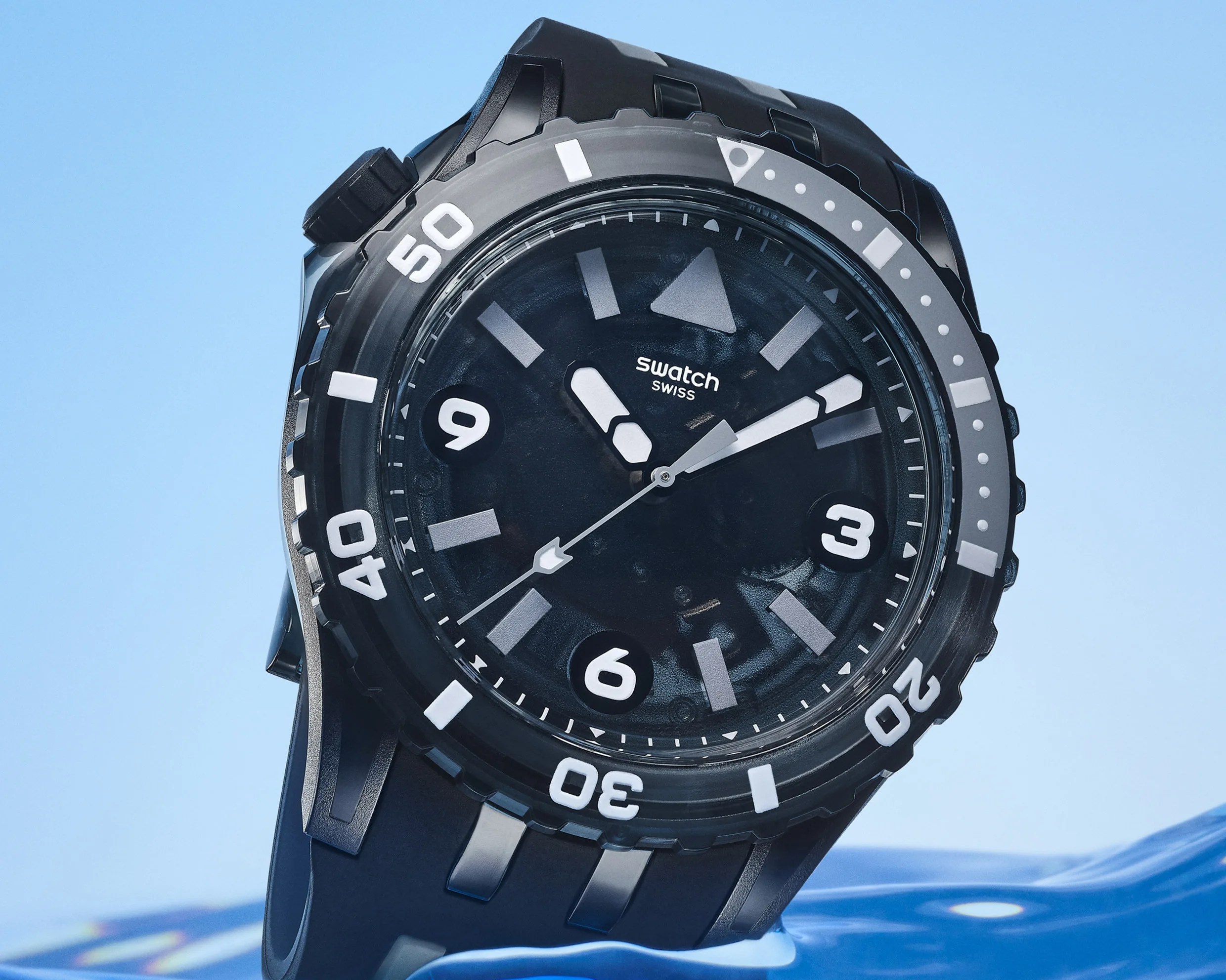 a black Swatch dive watch