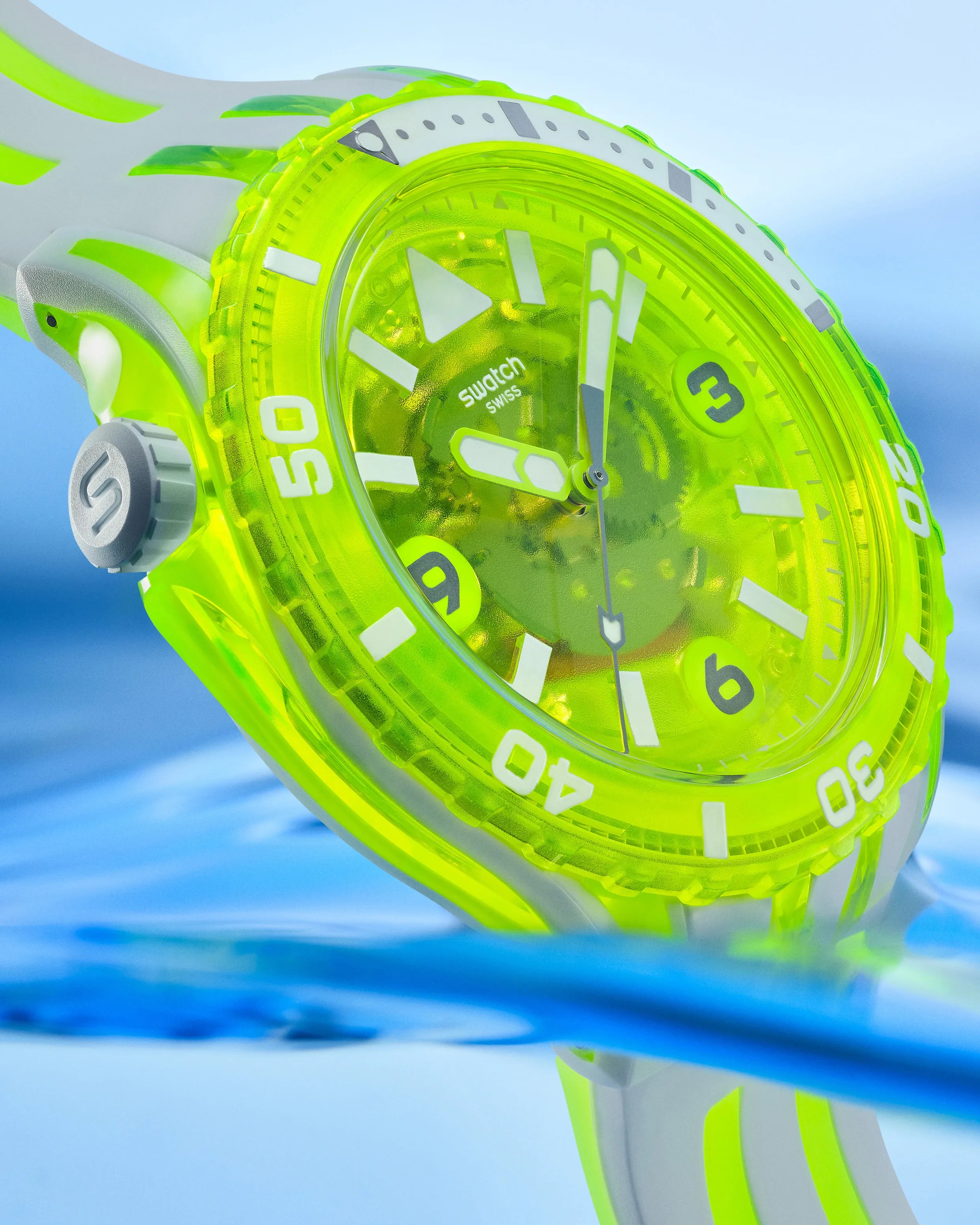 a green Swatch dive watch