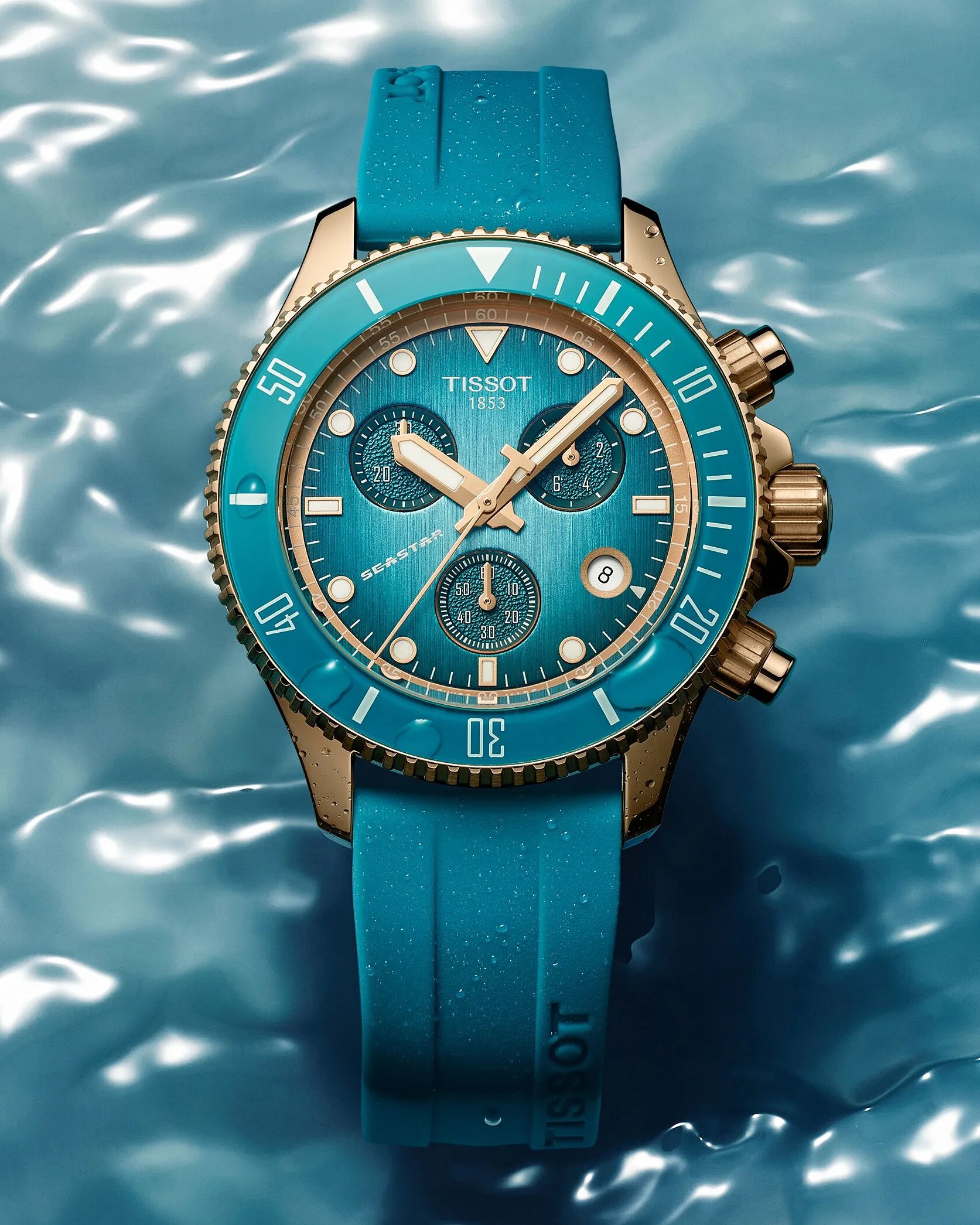 a turquoise Tissot dive watch