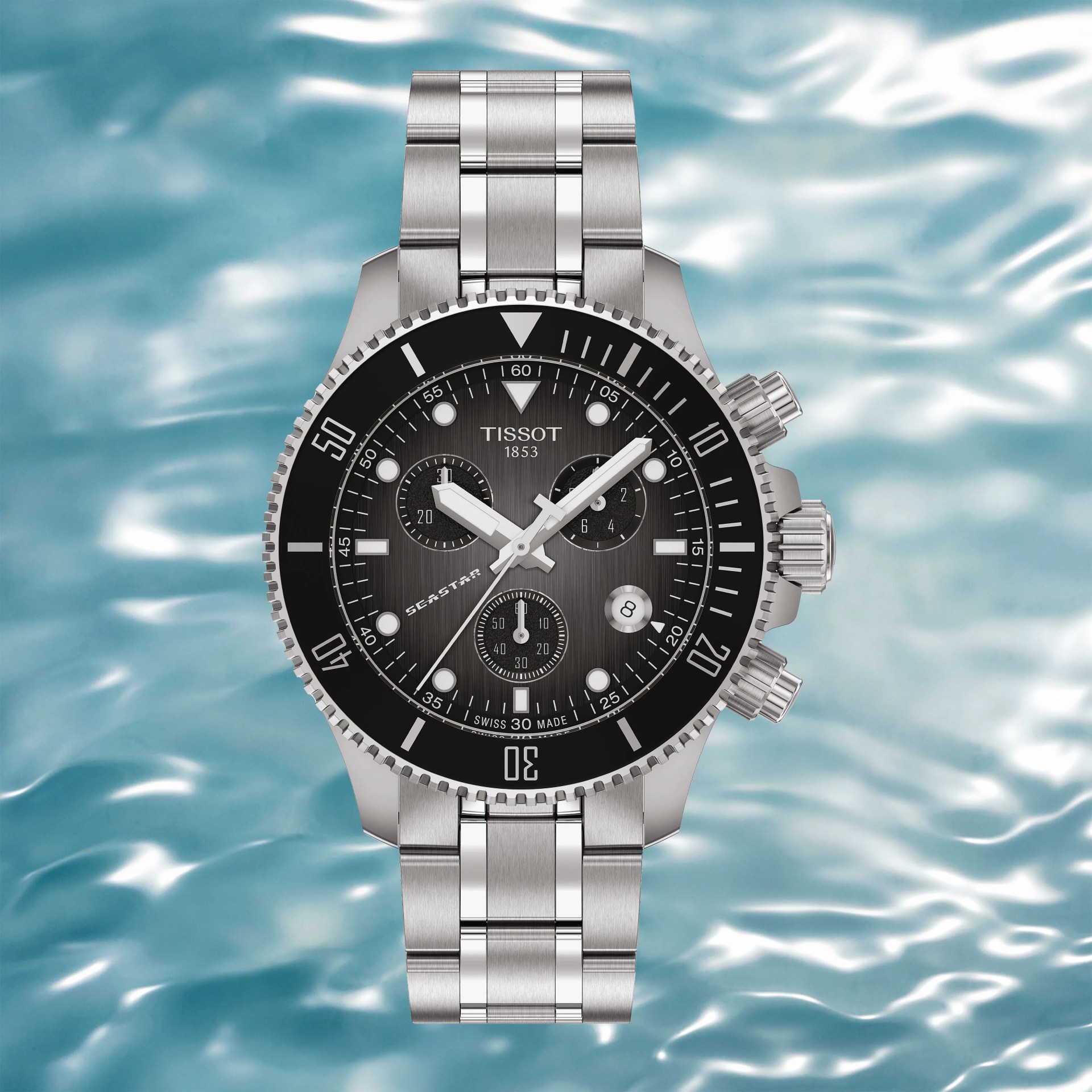 a Tissot dive watch with a black dial and bezel