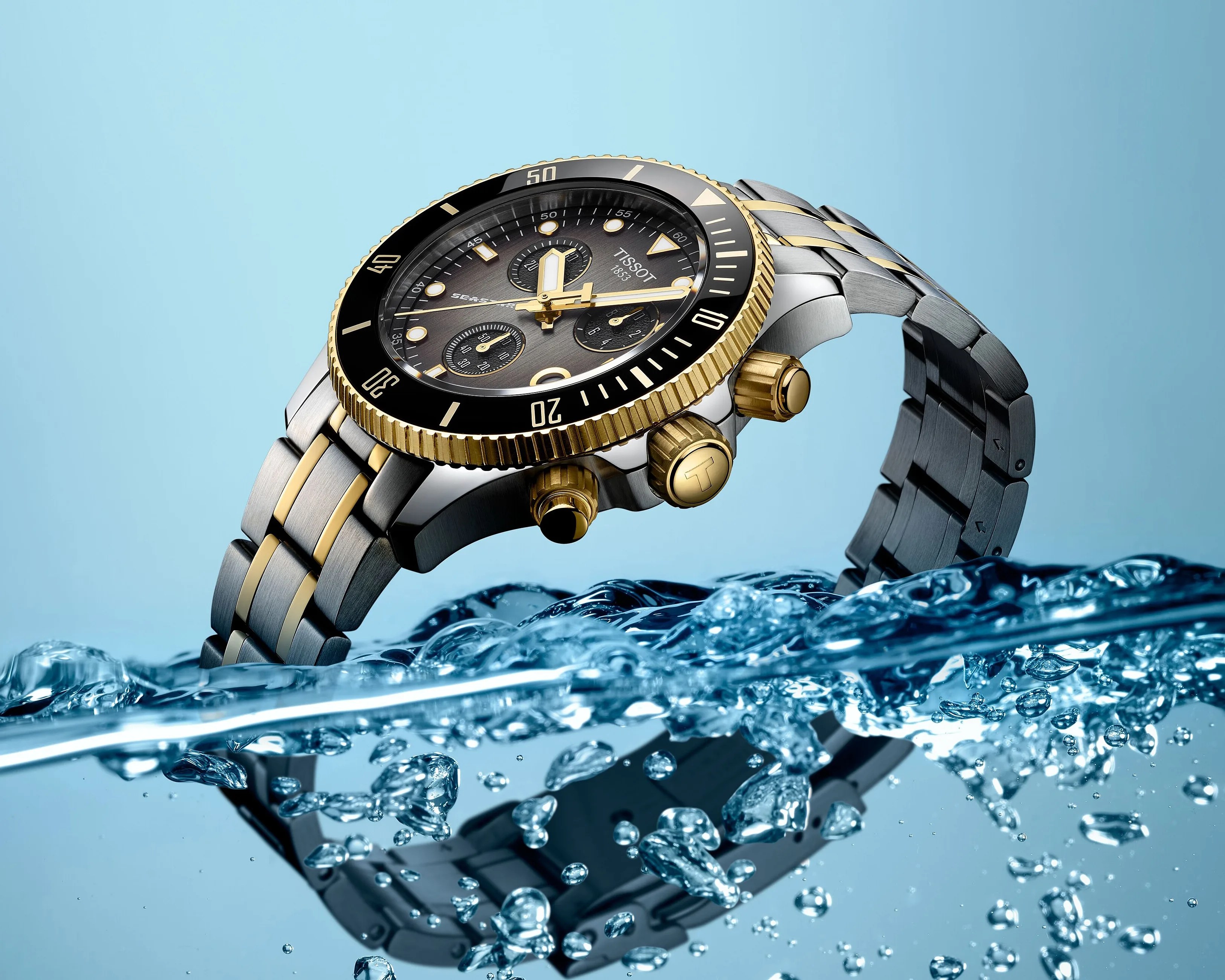 a two-tone Tissot chronograph watch