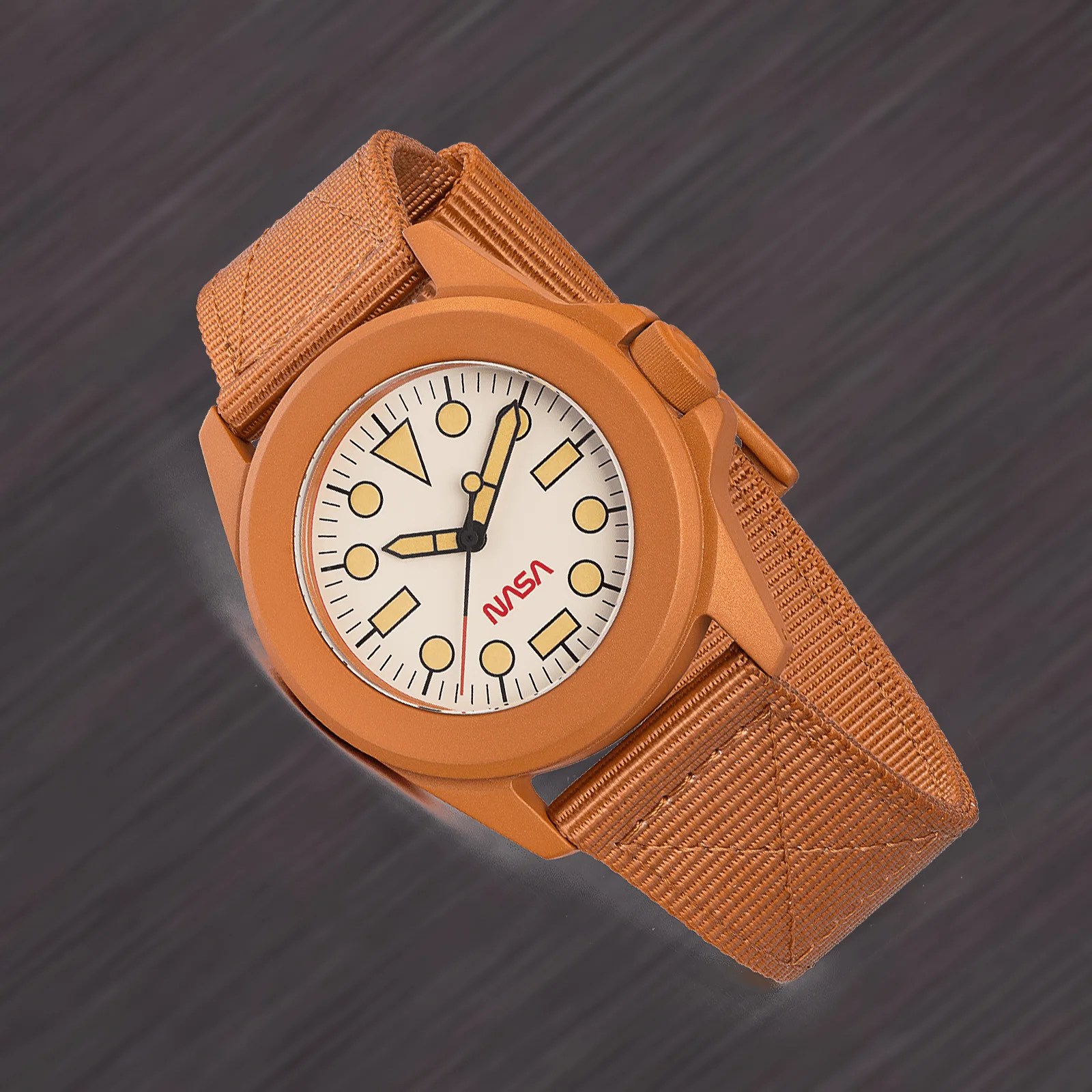 an orange Unimatic watch