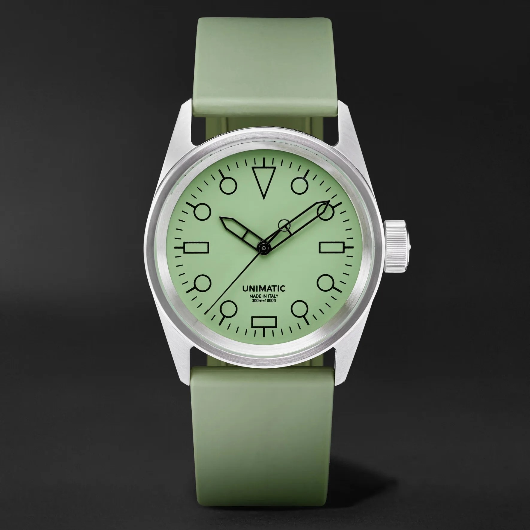 a green unimatic watch