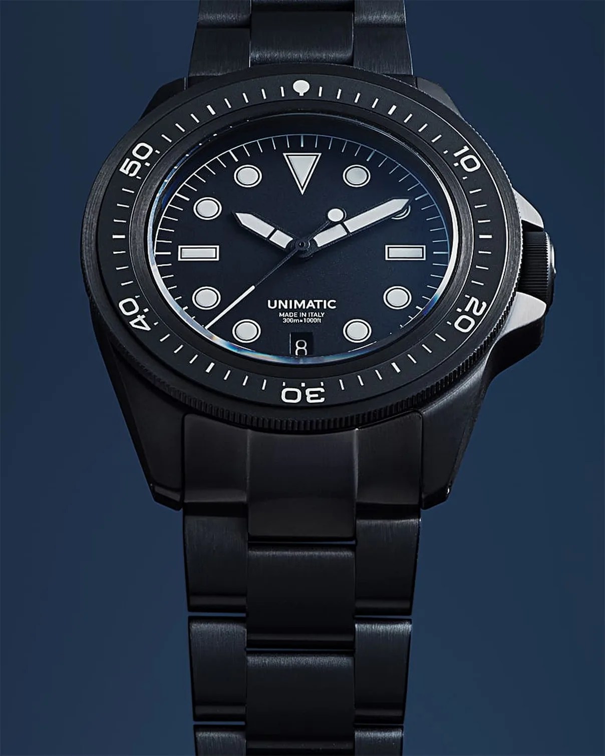 the dial and bracelet of a Unimatic dive watch